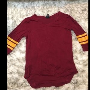 Red shirt w/ yellow bands